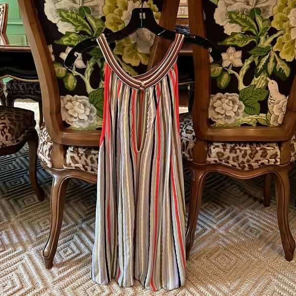 Lightweight knit sleeveless colorful top with attractive gold button at back. - Picture 5 of 5